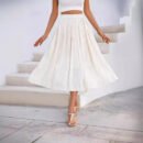 Upgrade Your Wardrobe with Our Spring and Autumn Half Length Pleated Skirt - Featuring Pearlescent Fabric and Elegant Pleats!