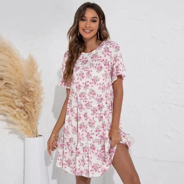 Stay Stylish this Summer with our Loose Fitting Floral Summer Dress for Women - Featuring Round Neck and Fragmented Leaf Sleeves!