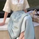 Upgrade Your Wardrobe with Our Spring and Autumn Half Length Pleated Skirt - Featuring Pearlescent Fabric and Elegant Pleats!