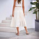 Upgrade Your Wardrobe with Our Spring and Autumn Half Length Pleated Skirt - Featuring Pearlescent Fabric and Elegant Pleats!